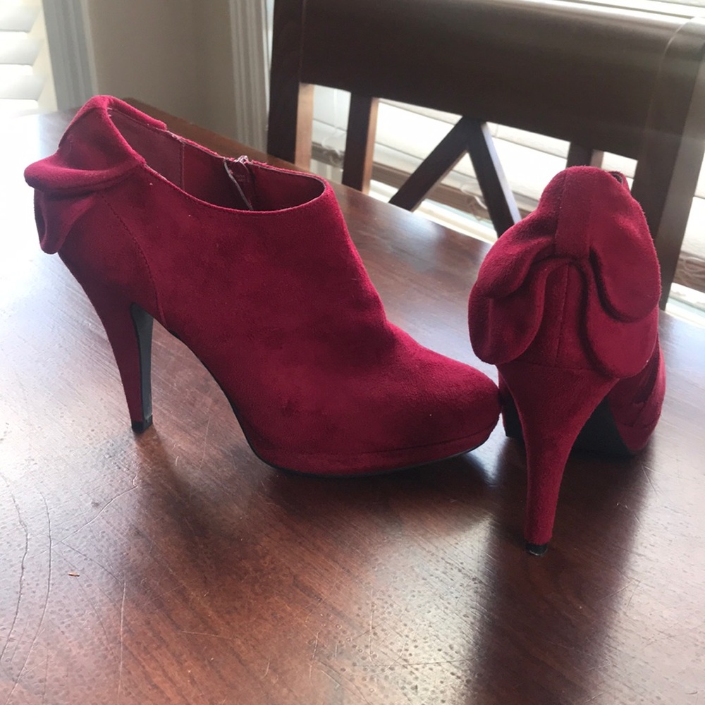 Red booties with bow detail